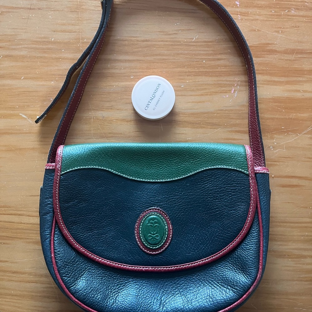 Elegant Black Leather Shoulder Bag with Gold Accents
